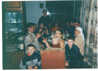 Большая семья за новогодним столом2001-2002гг.Бабушка сидит справа
